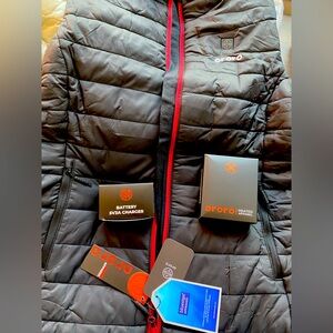 Womens Ororo Heated Vest. NWT size large